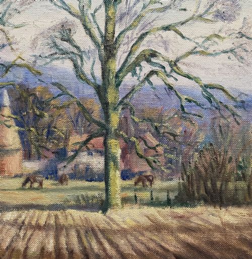 fig 5. An original landscape oil painting depicting a ploughed field and bare trees before a hop kiln, set in an ornate swept gilded frame.