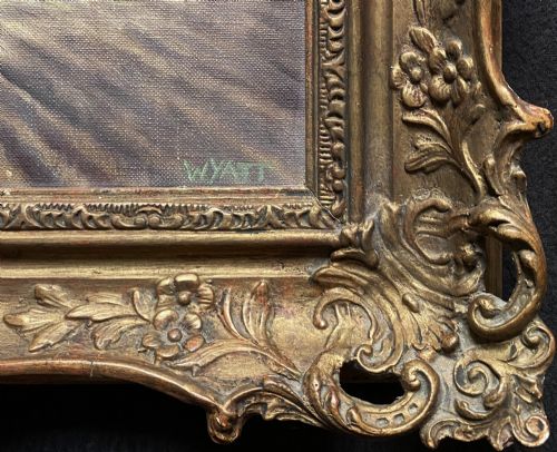 fig 7. An original landscape oil painting depicting a ploughed field and bare trees before a hop kiln, set in an ornate swept gilded frame.
