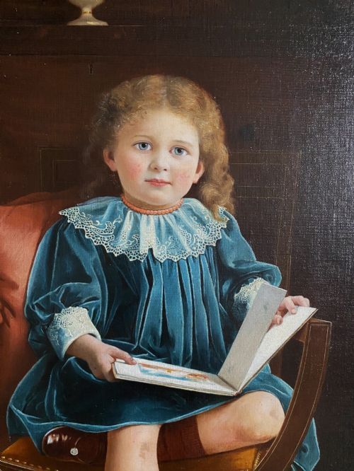 fig 8. An oil portrait on canvas depicting a young child in a blue dress seated in a wooden chair, enclosed within an ornate giltwood frame.
