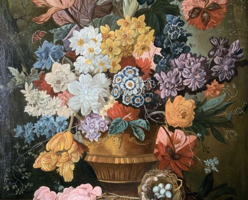 fig 4. A gilt-framed oil painting featuring a dense bouquet of colourful flowers in a classical urn alongside a birds nest with eggs.