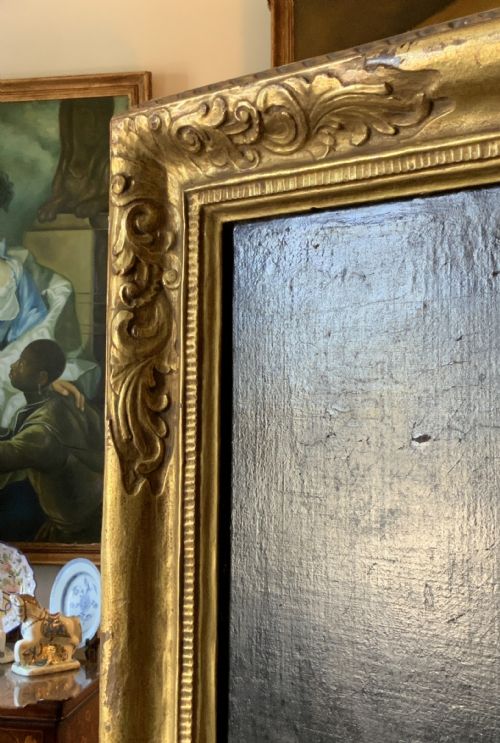 fig 10. A large gilt-framed Georgian oil painting on canvas depicting a woman in white classical drapery holding a torch against a dark background.