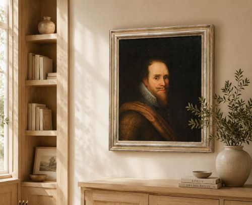 fig 1. A 17th-century Dutch Old Master oil portrait of a man with a beard, lace ruff, and armour, presented in a light-coloured moulded wooden frame.