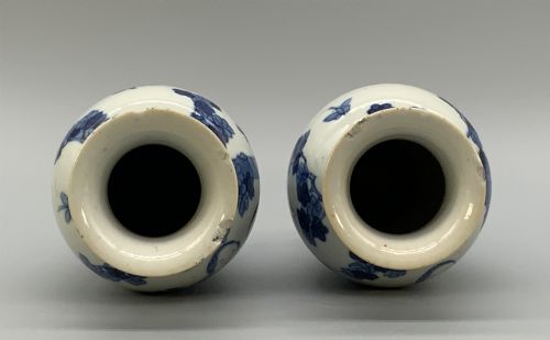 fig 8. A pair of flared Chinese blue and white porcelain vases hand painted with figural court ladies amidst floral motifs.