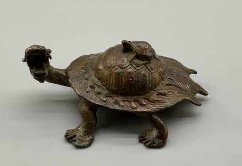 fig 2. A small Japanese Meiji period bronze sculpture of a minogame turtle with a smaller turtle perched on its shell.