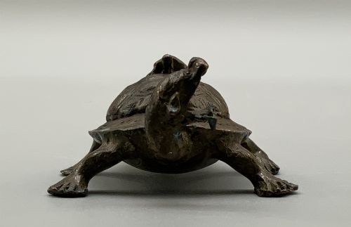 fig 6. A small Japanese Meiji period bronze sculpture of a minogame turtle with a smaller turtle perched on its shell.