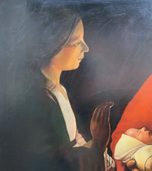 fig 7. A framed twentieth-century oil painting depicting two women in dramatic candlelight illumination leaning over a swaddled infant inside an ornate gold frame.