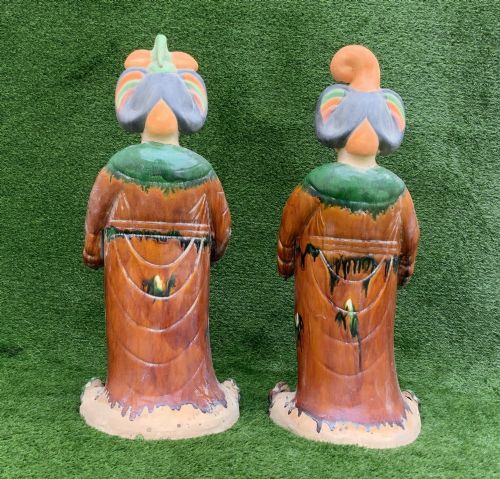 fig 5. A pair of standing terracotta female musician figures in Tang Dynasty style, finished with amber, green, and cream Sancai lead glazes.