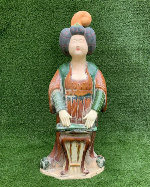 fig 6. A pair of standing terracotta female musician figures in Tang Dynasty style, finished with amber, green, and cream Sancai lead glazes.