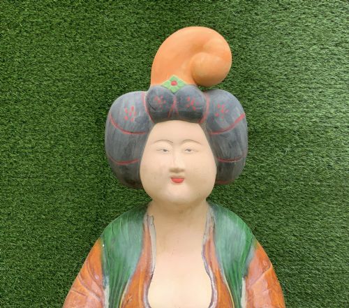 fig 7. A pair of standing terracotta female musician figures in Tang Dynasty style, finished with amber, green, and cream Sancai lead glazes.
