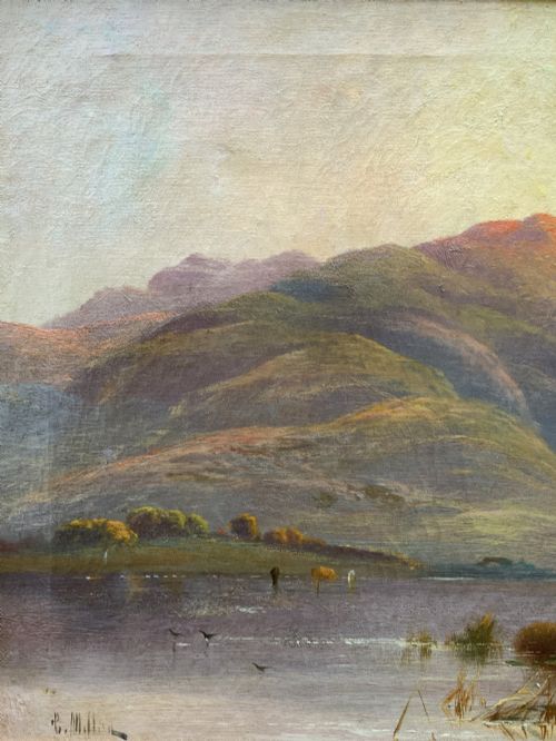 fig 6. A nineteenth-century oil painting on canvas depicting a Scottish loch and mountains illuminated by a sunset, displayed within a gilt carved frame.