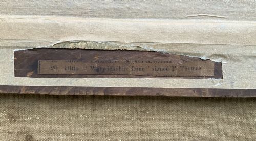 fig 9. A Victorian landscape oil painting depicting a rural scene with a horse-drawn cart crossing a stream beside mature trees and a cottage, set in an ornate gilt frame.