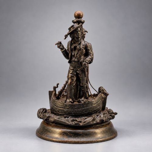 fig 4. A nineteenth-century dark patinated bronze sculpture depicting two fishermen standing in a small vessel atop sculpted ocean waves, mounted on a rounded base.
