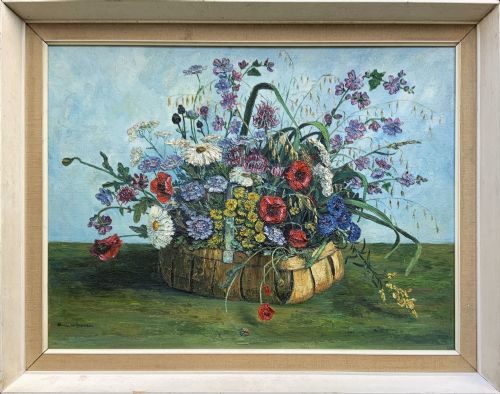 fig 1. A framed floral still life oil painting depicting a woven basket filled with colourful wildflowers including poppies and daisies against a light blue backdrop.