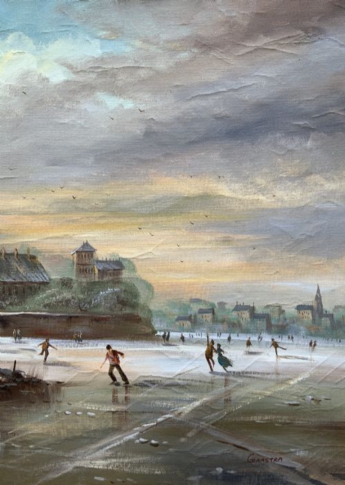 fig 5. A large framed oil painting depicting figures ice skating on a frozen canal beside historic stone buildings under a winter sky, housed in an ornate gilt frame.
