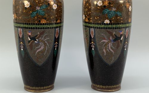 fig 4. A pair of Japanese Meiji period cloisonne enamel vases featuring detailed phoenix birds, floral motifs, and geometric borders on a dark background.