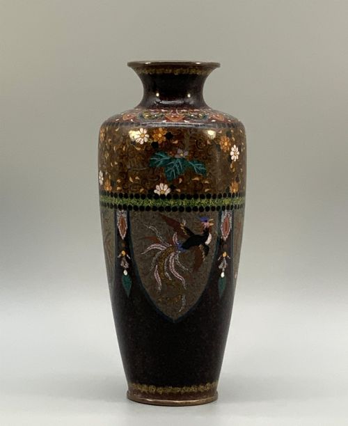 fig 6. A pair of Japanese Meiji period cloisonne enamel vases featuring detailed phoenix birds, floral motifs, and geometric borders on a dark background.