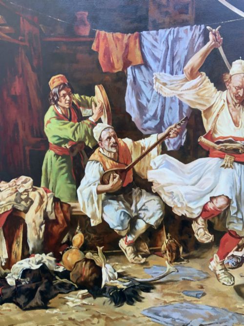 fig 6. A large mid-century framed oil painting depicting figures in traditional attire watching a man perform a sword dance inside a rustic interior.