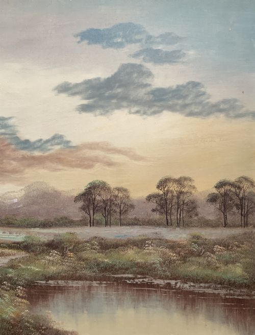 fig 5. A twentieth-century framed oil painting depicting a countryside path alongside a reflective pond, surrounded by tall trees and distant hills under a clouded sky.