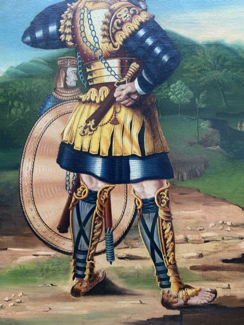 fig 9. An antique framed oil painting depicting the biblical scene of David and Goliath set against a green mountainous landscape.