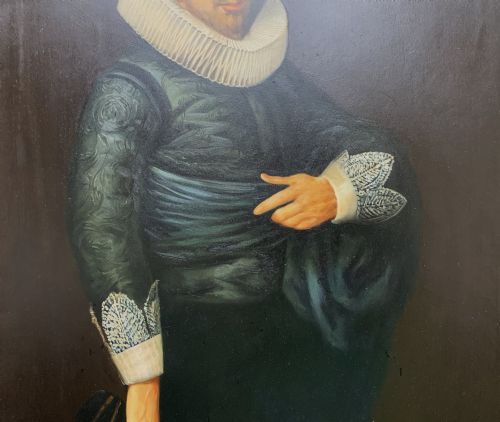 fig 4. A full-length oil painting depicting a 17th-century gentleman in a dark doublet and white ruff collar, set within a black and gold frame.