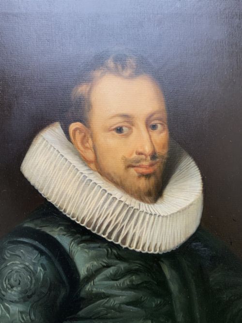 fig 7. A full-length oil painting depicting a 17th-century gentleman in a dark doublet and white ruff collar, set within a black and gold frame.