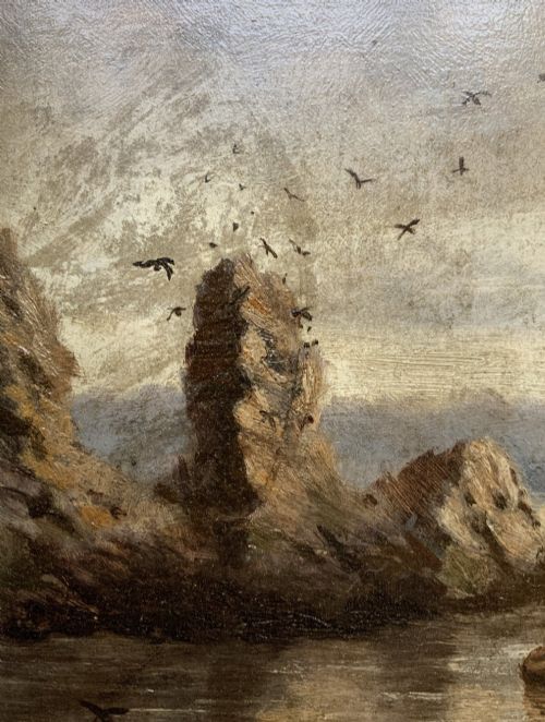 fig 6. A 19th-century miniature oil painting depicting a coastal cliff scene with a prominent rock stack, small boats, and birds in flight, set within a dark wooden frame.