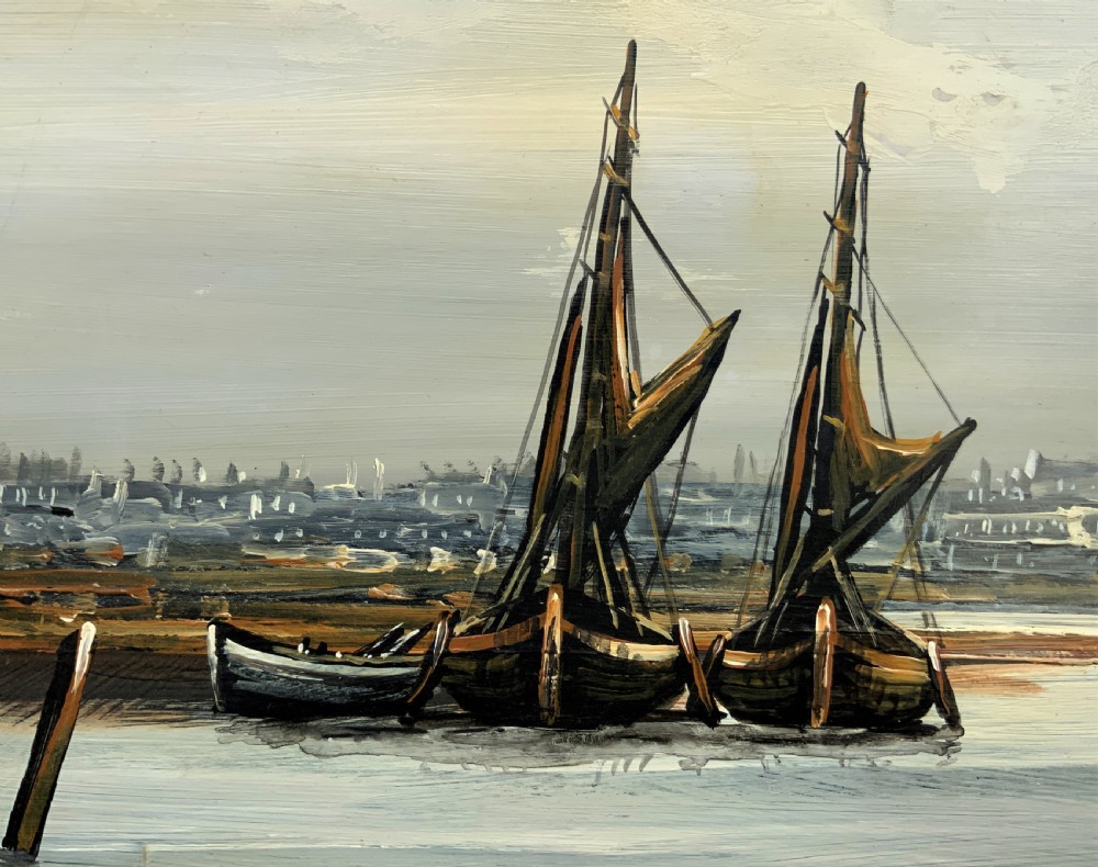 An impasto oil painting depicting two masted sailing barges moored on an estuary mudflat with an industrial skyline under a cloudy sky. View X
