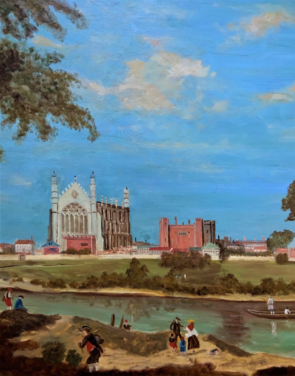 A large framed oil painting depicting Eton College Chapel across the River Thames with figures along the foreground bank under a blue sky. View V