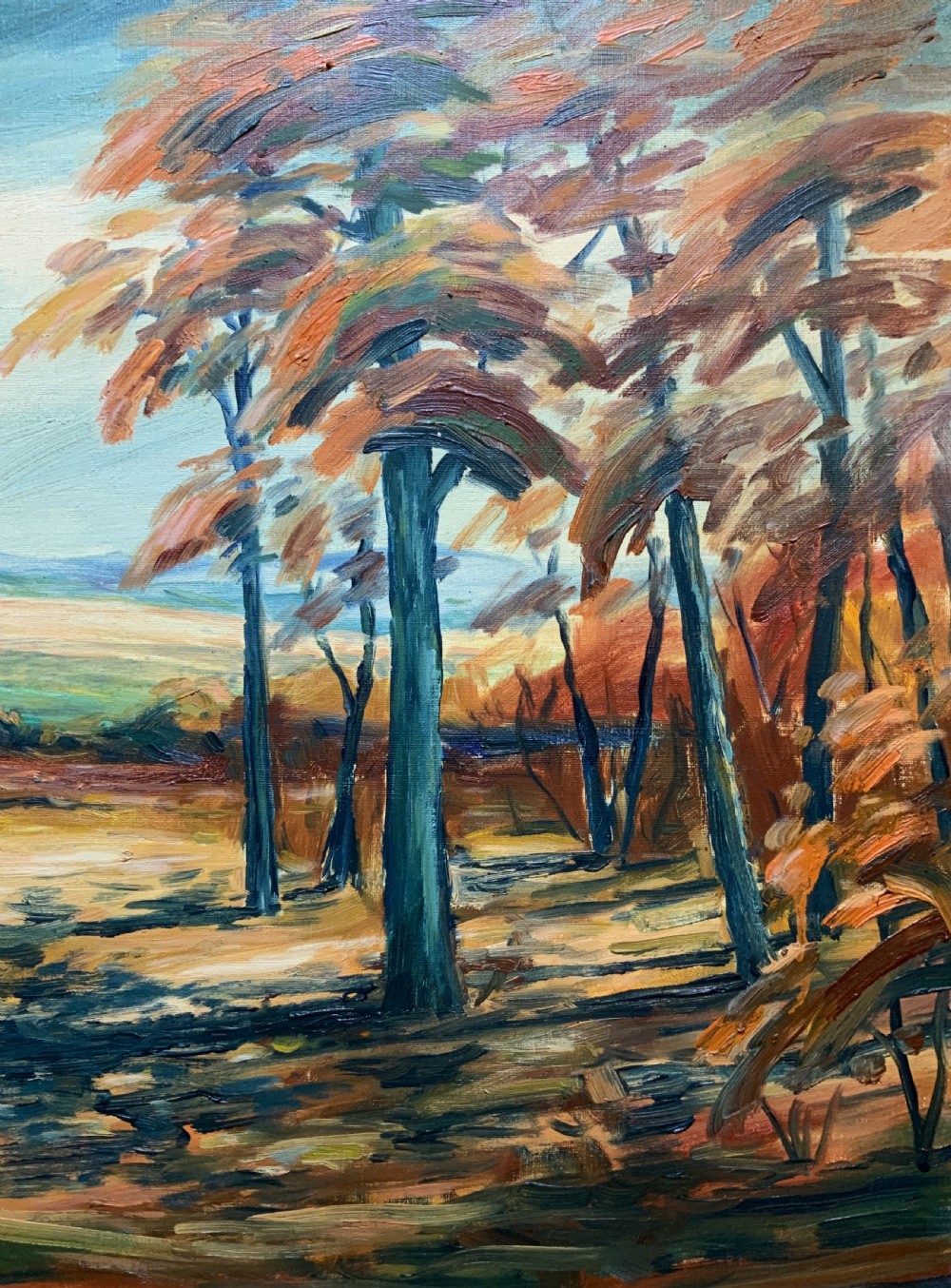 An oil painting depicting an autumnal Danish forest clearing with blue tree trunks and orange foliage, presented in a gold moulded frame. View V