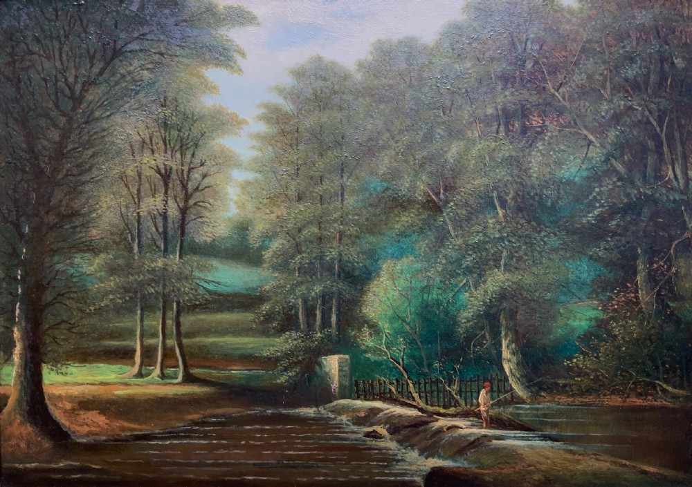 An early 20th-century landscape oil painting displaying a woodland river scene with a figure fishing near a weir, encased in a deep gold frame. View II