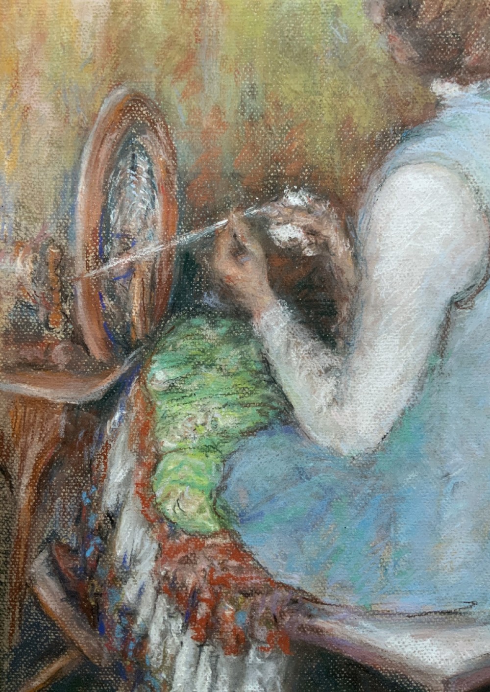 A framed 1951 post-impressionist pastel painting depicting a person in a light blue dress seated at a spinning wheel, set within a green mount and gold frame. View VIII