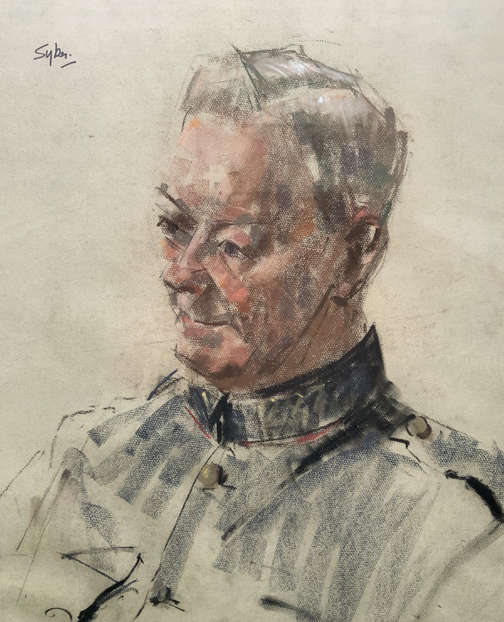 A framed twentieth-century pastel portrait drawing depicting a military officer in uniform within a carved gilt wood frame. View III