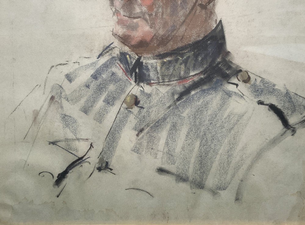 A framed twentieth-century pastel portrait drawing depicting a military officer in uniform within a carved gilt wood frame. View IV