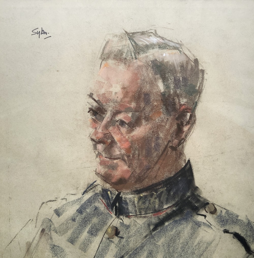 A framed twentieth-century pastel portrait drawing depicting a military officer in uniform within a carved gilt wood frame. View V