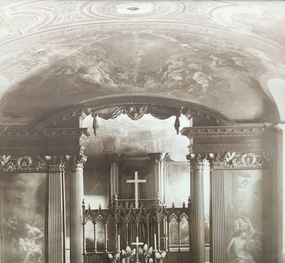 A 1921 sepia photograph depicting a church altar and choir, mounted in a moulded dark oak frame with an engraved metal presentation plaque along the bottom edge. View III