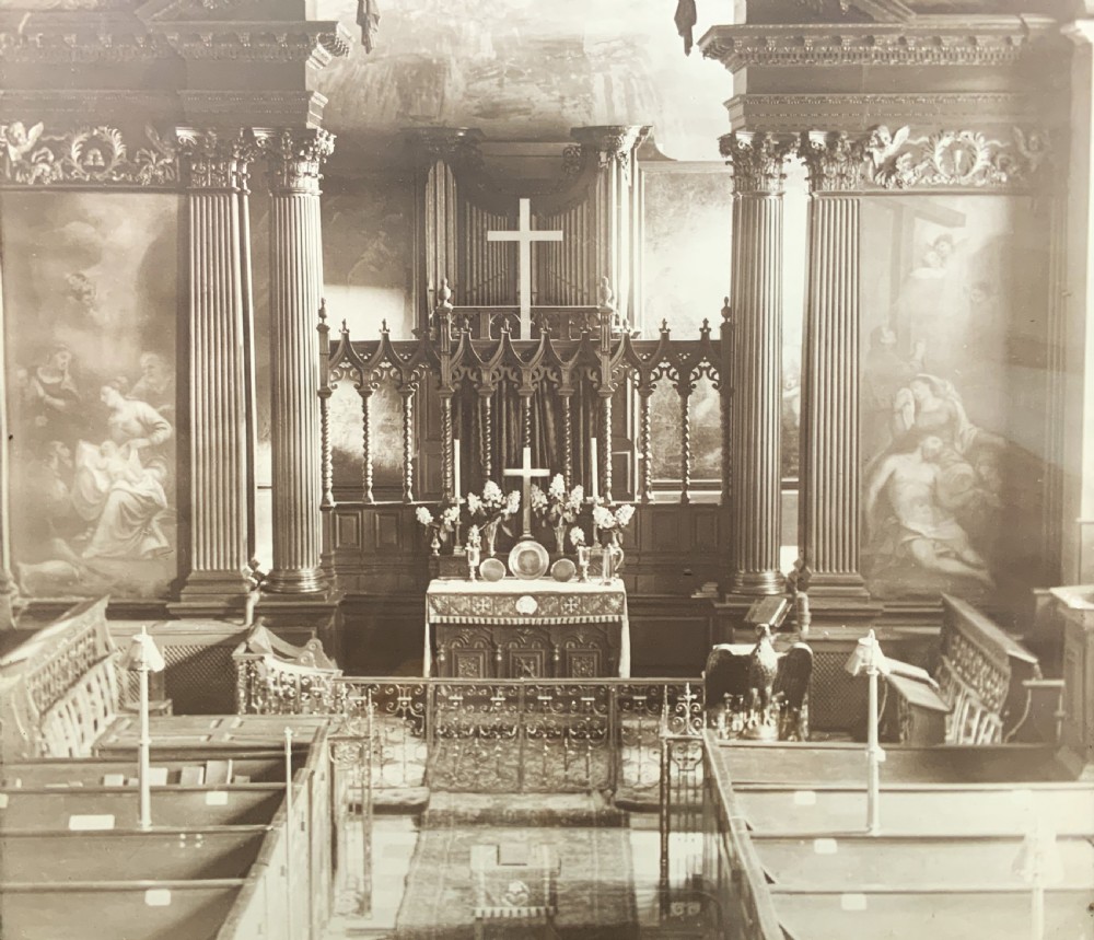A 1921 sepia photograph depicting a church altar and choir, mounted in a moulded dark oak frame with an engraved metal presentation plaque along the bottom edge. View VII