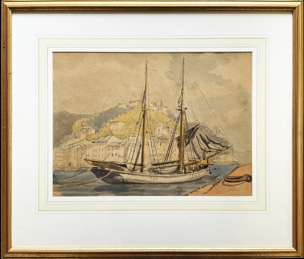 A framed 19th-century watercolour painting depicting a two-masted sailing yacht moored in a coastal harbour in front of a hillside town.