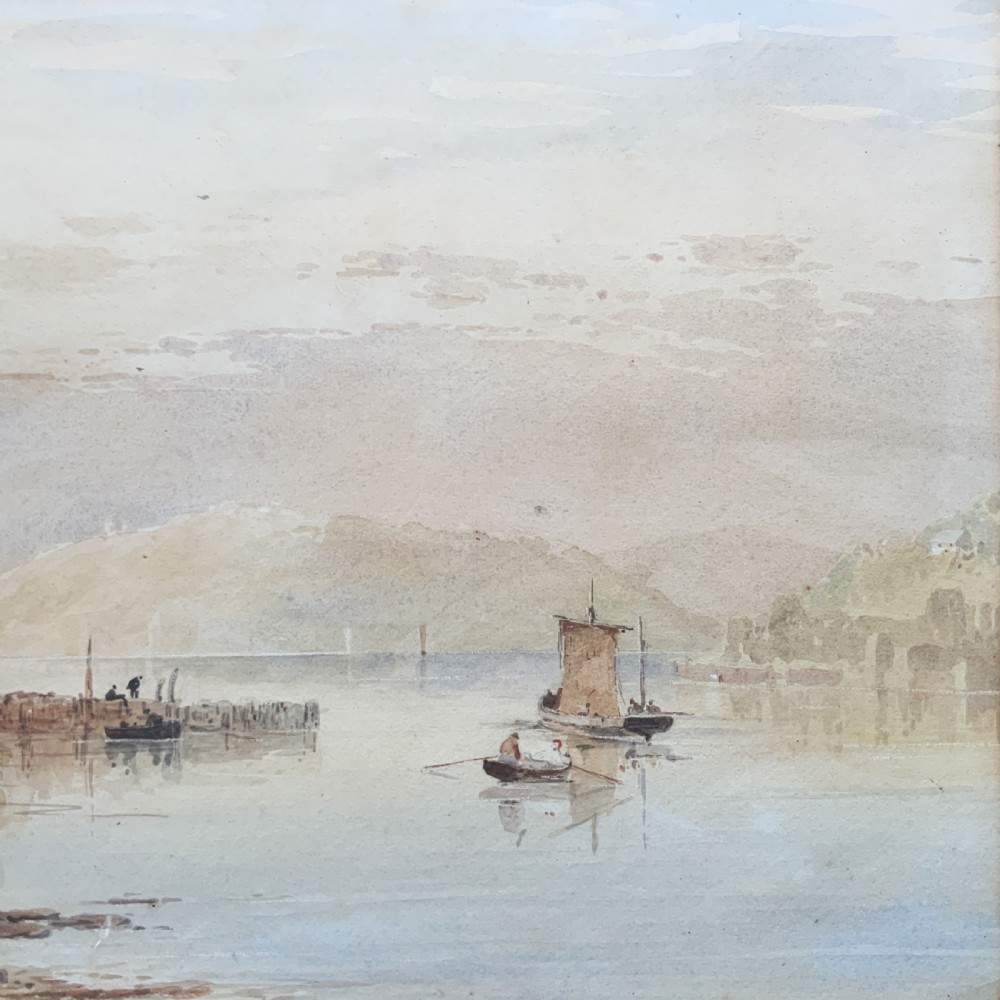 A 19th-century Victorian watercolour painting depicting a calm Welsh lake with figures and cottages, framed in an ornate carved giltwood frame. View VI
