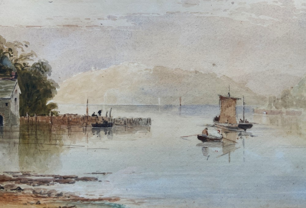 A 19th-century Victorian watercolour painting depicting a calm Welsh lake with figures and cottages, framed in an ornate carved giltwood frame. View VII