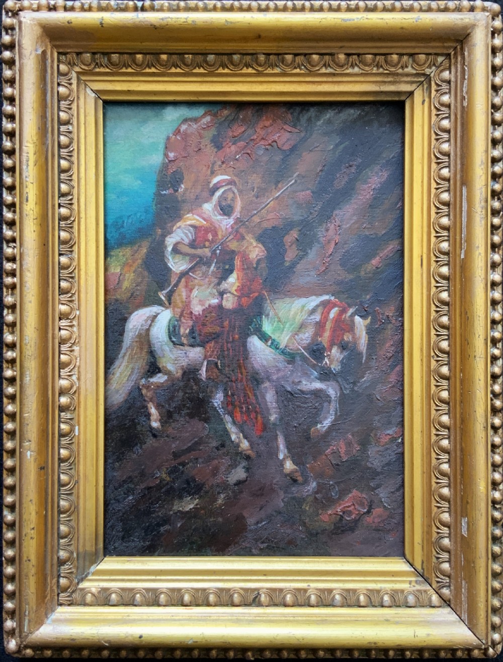 An Arabian Horseman LATE 19th CENTURY OIL ON PANEL PAINTING IN GILTWOOD FRAME