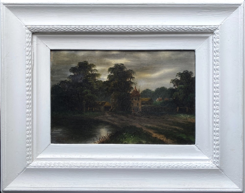 A 19th-century nocturnal oil painting depicting a moonlit rural landscape with trees and water, framed in a wide off-white moulded frame. View XII