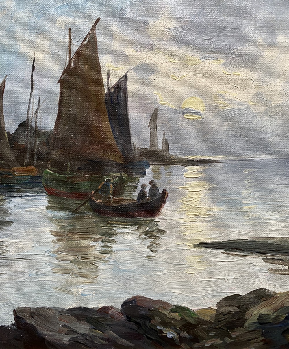 An impressionist oil painting depicting sailboats and figures in a calm harbour at sunset, enclosed within a textured gilt frame. View VI
