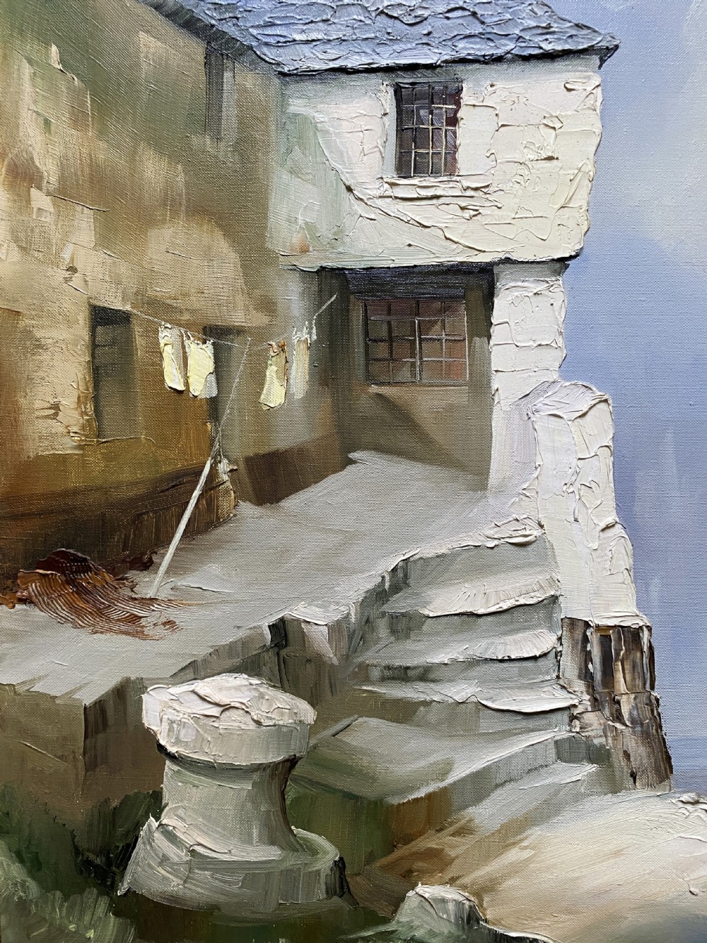 Framed mid-century oil painting depicting stone cottages and harbour steps in a Cornish coastal village with impasto texture. View IX