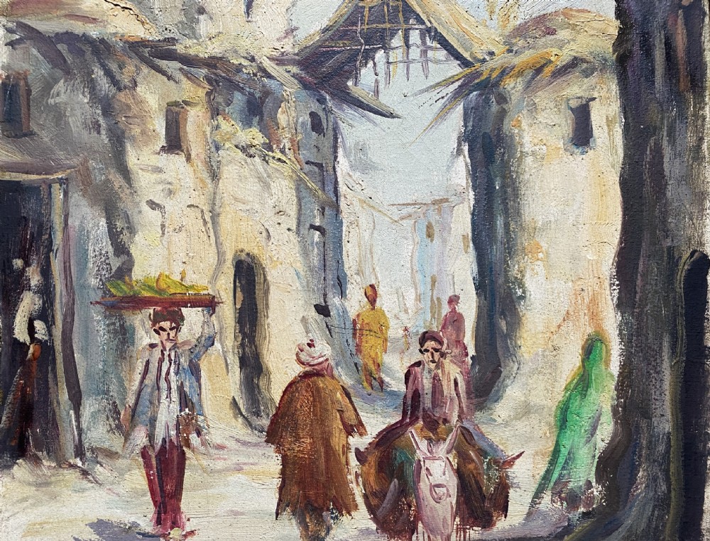 An impressionist oil painting depicting a village street with figures and a donkey, set within a carved gilt wood frame. View VI