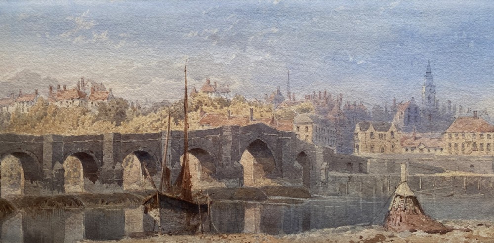 A framed 19th-century watercolour painting depicting a river and stone arch bridge in Hereford with a skyline, set within a gilded frame and cream mount. View III