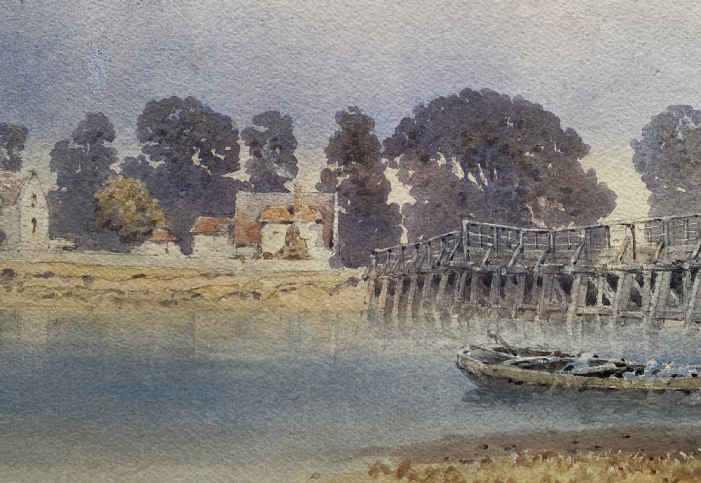 A framed watercolour painting depicting a wooden toll bridge across a river with a small boat and church in the background, set in a gilded frame. View VII