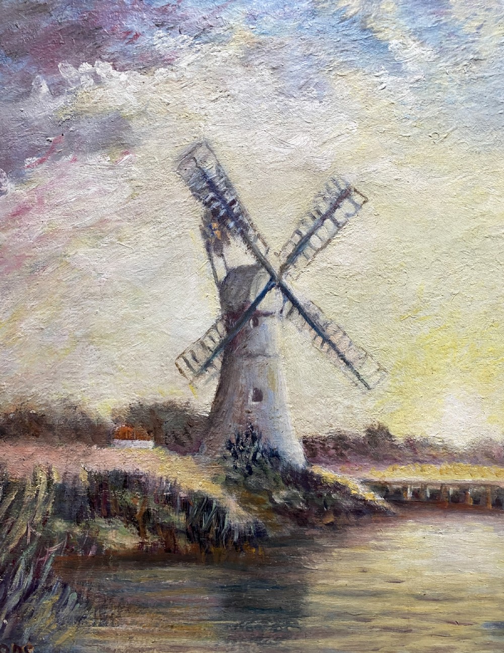 A framed post-war impressionist oil painting depicting sailboats navigating a river past a traditional windmill against a cloud-filled sky. View VII