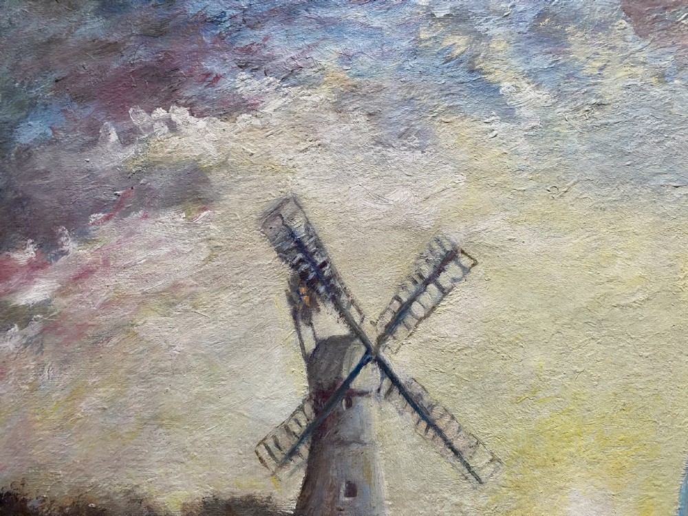 A framed post-war impressionist oil painting depicting sailboats navigating a river past a traditional windmill against a cloud-filled sky. View IX