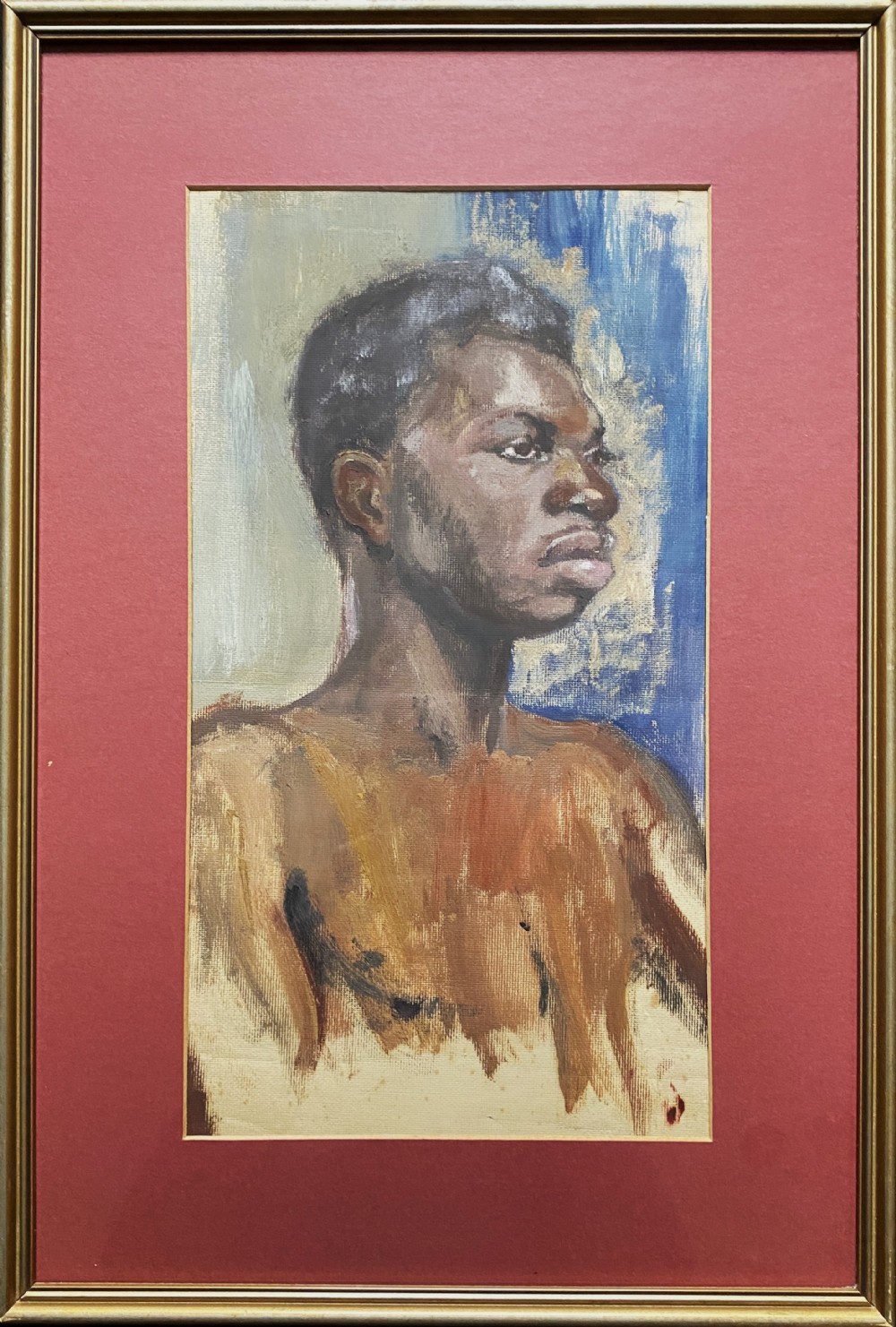 A framed mid-century oil painting on canvas depicting a head and shoulders study of a young male model set against a blue and grey backdrop.