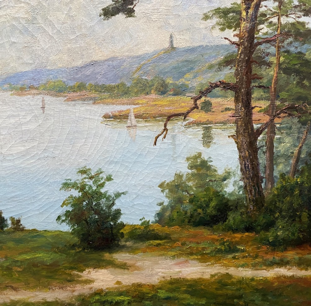 A signed 20th-century oil painting depicting a calm lake with sailboats framed by birch and pine trees in a silvered wooden frame. View VII